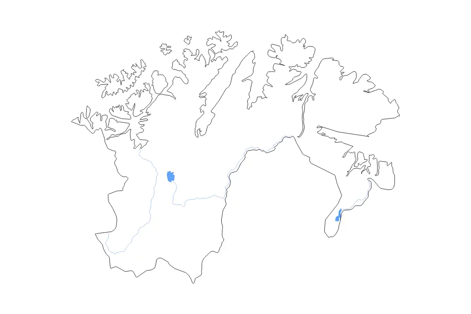 Outline map of Finnmark County, Norway with subdivision borders and major lakes and rivers.