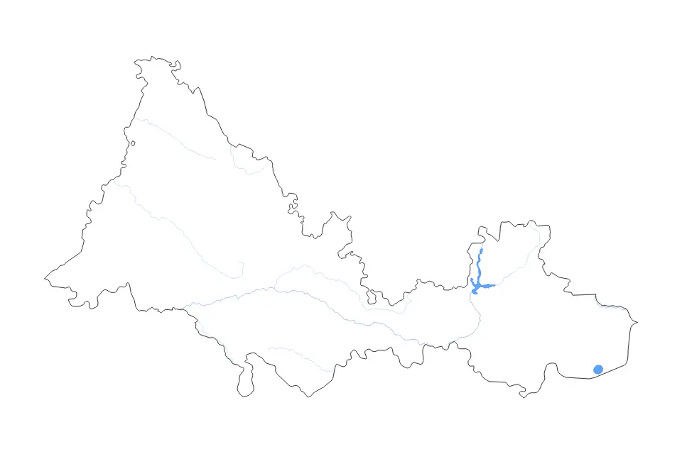 Outline map of Orenburg, Russian Federation with subdivision borders and major lakes and rivers.