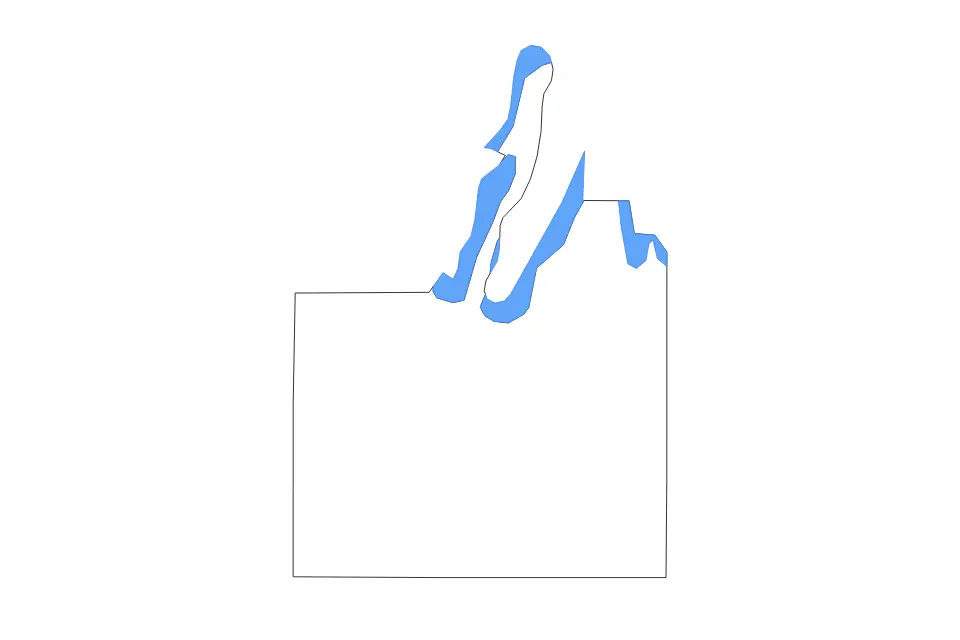 Outline map of Grand Traverse County, Michigan with subdivision borders and major lakes.
