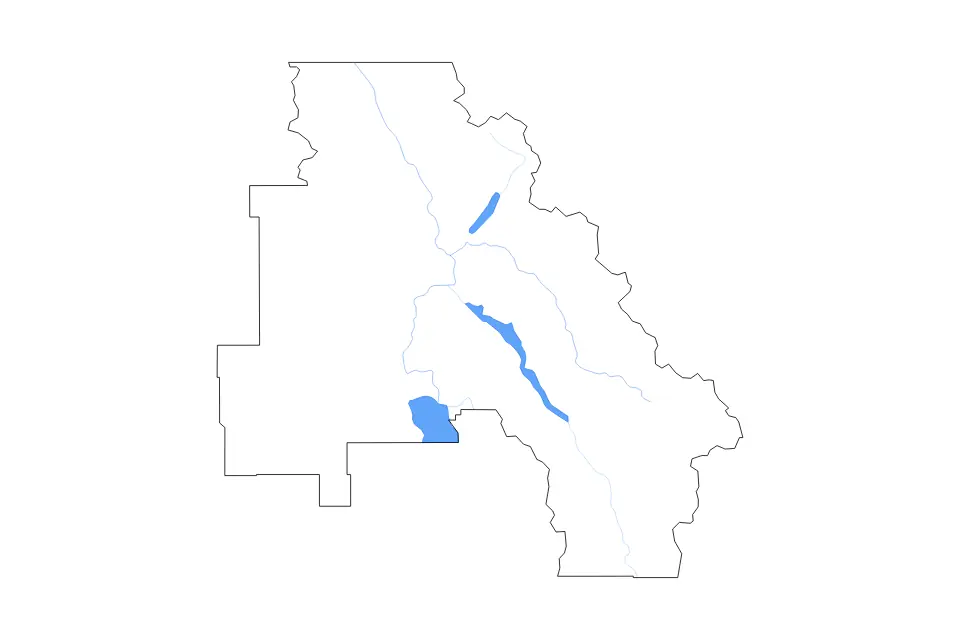Outline map of Flathead County, Montana with subdivision borders and major lakes and rivers.