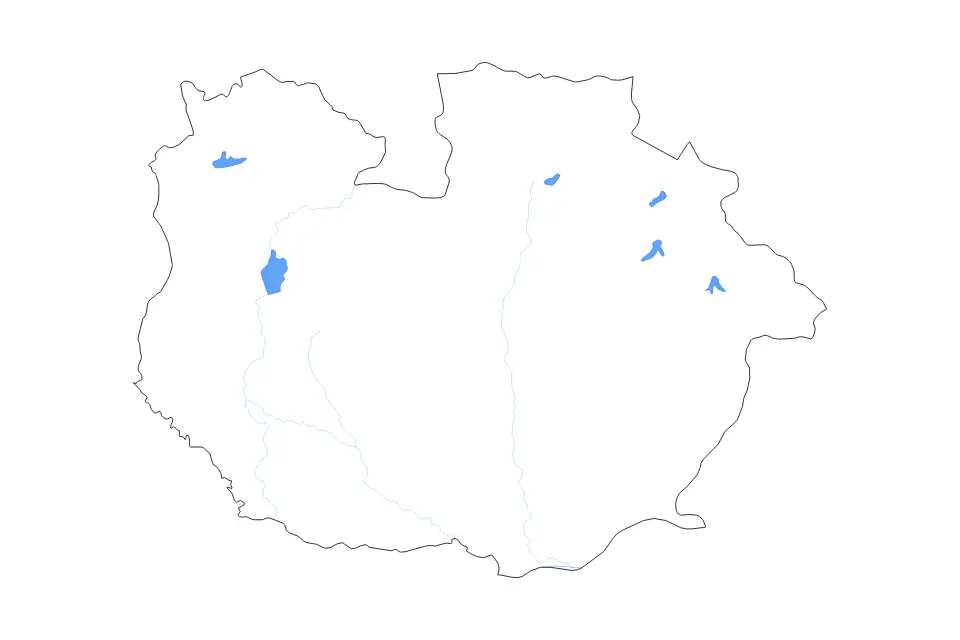 Outline map of Guárico State, Venezuela with subdivision borders and major lakes and rivers.
